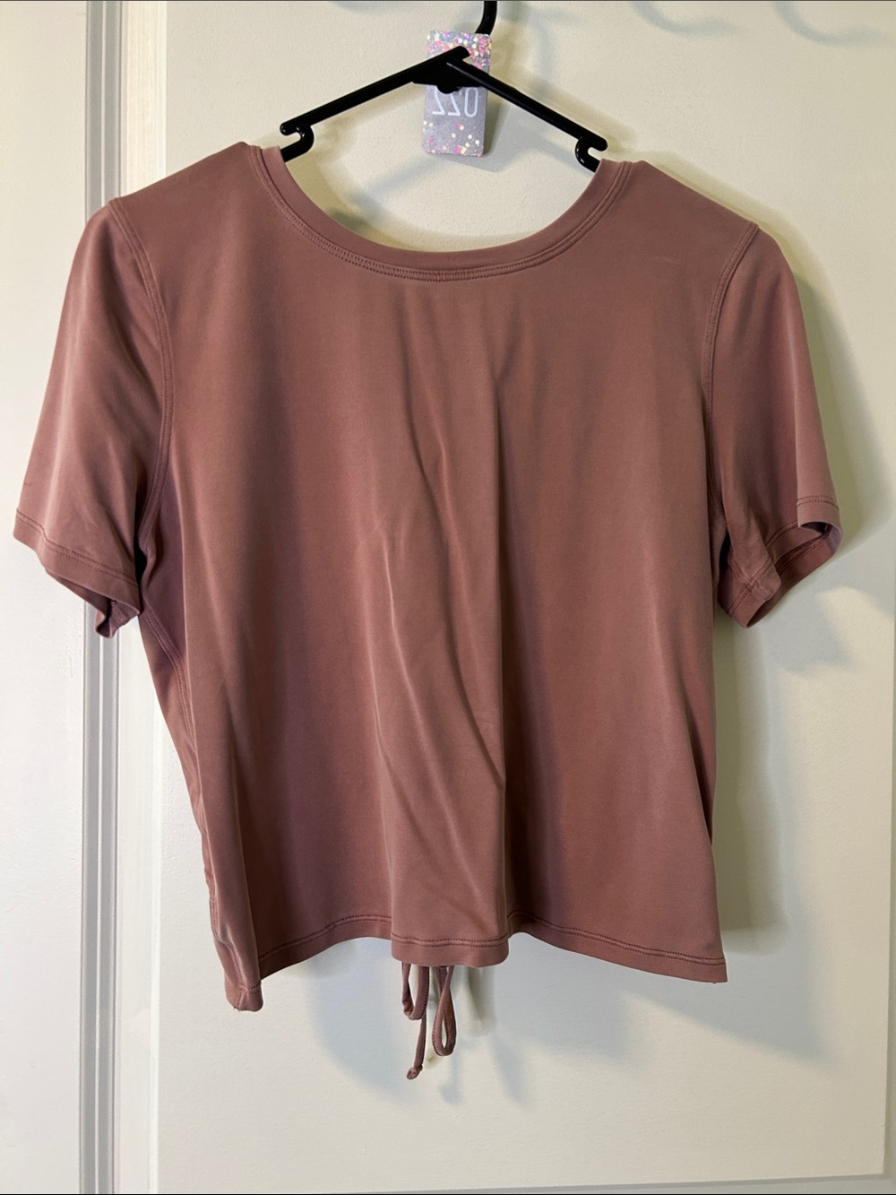 22. Lululemon athletica Short Sleeve Drawcord Tee in Dusty Mauve